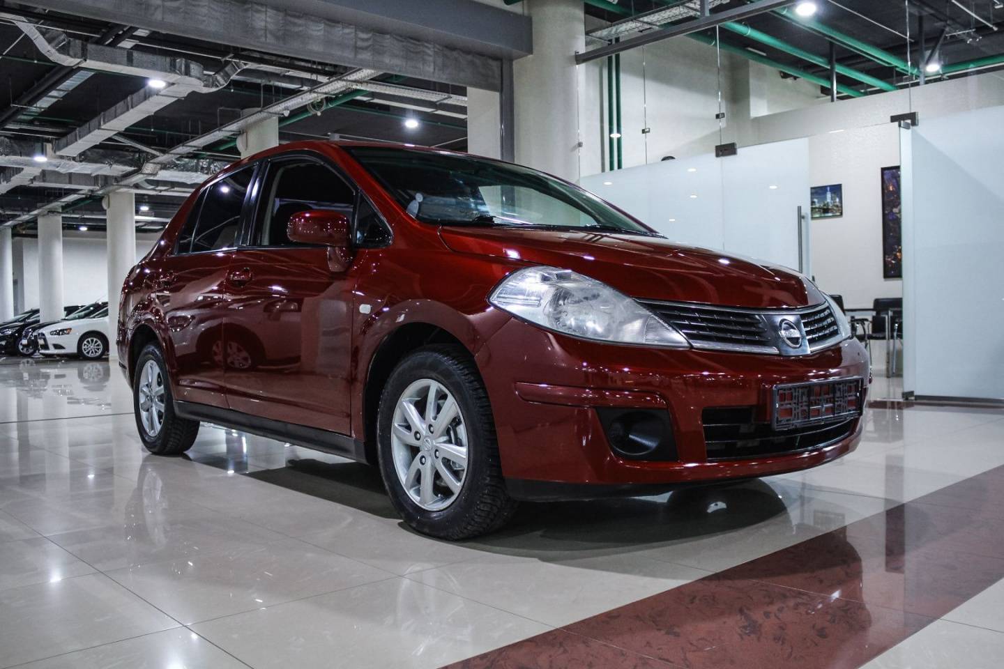 Купить Tiida с пробегом